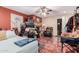 Bedroom with a fireplace and a sitting area at 3601 W Solano Dr, Phoenix, AZ 85019