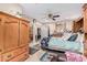 Main bedroom with a queen-size bed and walk-in closet at 3601 W Solano Dr, Phoenix, AZ 85019