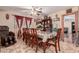 Dining area featuring a wood table and chairs at 3601 W Solano Dr, Phoenix, AZ 85019