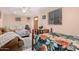 Furnished guest house bedroom with two beds and a desk at 3601 W Solano Dr, Phoenix, AZ 85019