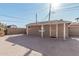 Exterior view of detached guest house with concrete patio at 3601 W Solano Dr, Phoenix, AZ 85019