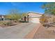 One-story house with a two-car garage and desert landscaping at 3766 W Jacksonville Dr, Anthem, AZ 85086