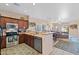 Kitchen with stainless steel appliances and wood cabinets at 3766 W Jacksonville Dr, Anthem, AZ 85086