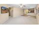 Open living room featuring an entertainment center and seamless access to the open kitchen area at 3766 W Jacksonville Dr, Anthem, AZ 85086