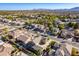Aerial view of a residential area showing a two-story house with a nicely landscaped yard at 3798 E Latham Ct, Gilbert, AZ 85297