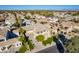 Aerial view of a two story house with a landscaped yard in a quiet neighborhood at 3798 E Latham Ct, Gilbert, AZ 85297