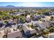 Aerial view of a house with a pool and a landscaped yard, nestled within a residential community at 3798 E Latham Ct, Gilbert, AZ 85297