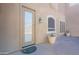 Private back patio with door access and potted plants at 3798 E Latham Ct, Gilbert, AZ 85297