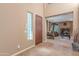 Bright entryway with a view into the living room and fireplace at 3798 E Latham Ct, Gilbert, AZ 85297