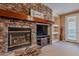 Stone fireplace in Gathering room, creating a cozy ambiance at 3798 E Latham Ct, Gilbert, AZ 85297