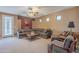 Gathering room with sectional sofa and access to backyard at 3798 E Latham Ct, Gilbert, AZ 85297