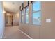 Bright hallway with carpet flooring and access to other rooms at 3798 E Latham Ct, Gilbert, AZ 85297