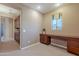 Spacious home office features built-in cabinets and a large desk at 3798 E Latham Ct, Gilbert, AZ 85297