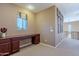 Bright home office with a desk and view of the home's second floor at 3798 E Latham Ct, Gilbert, AZ 85297