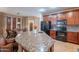 Large kitchen with an island and breakfast area, perfect for entertaining at 3798 E Latham Ct, Gilbert, AZ 85297