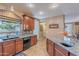 Kitchen with granite island and breakfast bar, open to Gathering room at 3798 E Latham Ct, Gilbert, AZ 85297