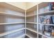 Walk-in pantry with ample shelving for storage at 3798 E Latham Ct, Gilbert, AZ 85297
