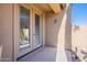 Tan colored patio with double doors leading inside at 3798 E Latham Ct, Gilbert, AZ 85297