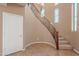 Elegant curved staircase with wrought iron railing at 3798 E Latham Ct, Gilbert, AZ 85297