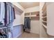 Large walk-in closet with shelves and hanging rods at 3798 E Latham Ct, Gilbert, AZ 85297