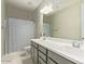 Clean bathroom with double vanity and shower at 42206 W Capistrano Dr, Maricopa, AZ 85138