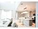 Open concept kitchen with island and modern appliances at 42206 W Capistrano Dr, Maricopa, AZ 85138