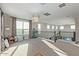 Large loft area with carpeted floor and plenty of natural light at 42206 W Capistrano Dr, Maricopa, AZ 85138