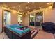 Cozy patio with sectional sofa and string lights at 42206 W Capistrano Dr, Maricopa, AZ 85138