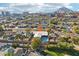 Aerial view showing the home's location in the neighborhood, highlighting its pool and proximity to other houses at 4601 N 75Th St, Scottsdale, AZ 85251