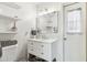 Clean bathroom with white vanity and a large mirror at 4601 N 75Th St, Scottsdale, AZ 85251