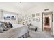 Spacious primary bedroom featuring a gallery wall and ample natural light at 4601 N 75Th St, Scottsdale, AZ 85251