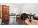 Home office features wood floors, built-in shelving and comfortable seating at 4601 N 75Th St, Scottsdale, AZ 85251