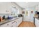 Bright eat-in kitchen with ample cabinetry and granite countertops at 4601 N 75Th St, Scottsdale, AZ 85251