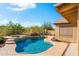 Blue swimming pool with a spa and a basketball hoop at 4611 E Morning Vista Ln, Cave Creek, AZ 85331