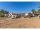 Backyard view, showing a tent and storage shed at 5309 W Gardenia Ave, Glendale, AZ 85301