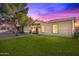 Cute bungalow with a grassy front yard at 5309 W Gardenia Ave, Glendale, AZ 85301