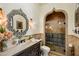 Elegant bathroom with a walk-in shower and ornate tile at 66 Biltmore Est, Phoenix, AZ 85016