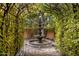 Serene courtyard fountain with lush greenery at 66 Biltmore Est, Phoenix, AZ 85016