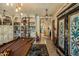 Game room with a pool table, built-in bookshelves, and ornate decor at 66 Biltmore Est, Phoenix, AZ 85016