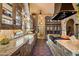 Gourmet kitchen with custom cabinetry and high-end appliances at 66 Biltmore Est, Phoenix, AZ 85016