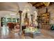 Spacious living area with fireplace and unique architectural details at 66 Biltmore Est, Phoenix, AZ 85016