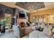 Spacious living room with fireplace and access to the backyard at 66 Biltmore Est, Phoenix, AZ 85016