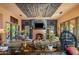 Living room features a fireplace and a unique ceiling design at 66 Biltmore Est, Phoenix, AZ 85016