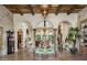 Grand living room with a central fountain and high ceilings at 66 Biltmore Est, Phoenix, AZ 85016