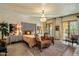 Spacious main bedroom with a large bed and access to a patio at 66 Biltmore Est, Phoenix, AZ 85016