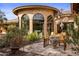 Outdoor patio area with seating and fire pit at 66 Biltmore Est, Phoenix, AZ 85016