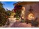 Inviting patio with fire pit and comfortable seating at 66 Biltmore Est, Phoenix, AZ 85016