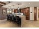 Gourmet kitchen with island, stainless steel appliances, and custom cabinetry at 7181 E Camelback Rd # 506, Scottsdale, AZ 85251