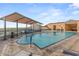 Relaxing rooftop pool and patio area with city views at 7181 E Camelback Rd # 506, Scottsdale, AZ 85251