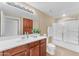 Bathroom with updated vanity and shower/tub combo at 750 E Northern Ave # 1134, Phoenix, AZ 85020